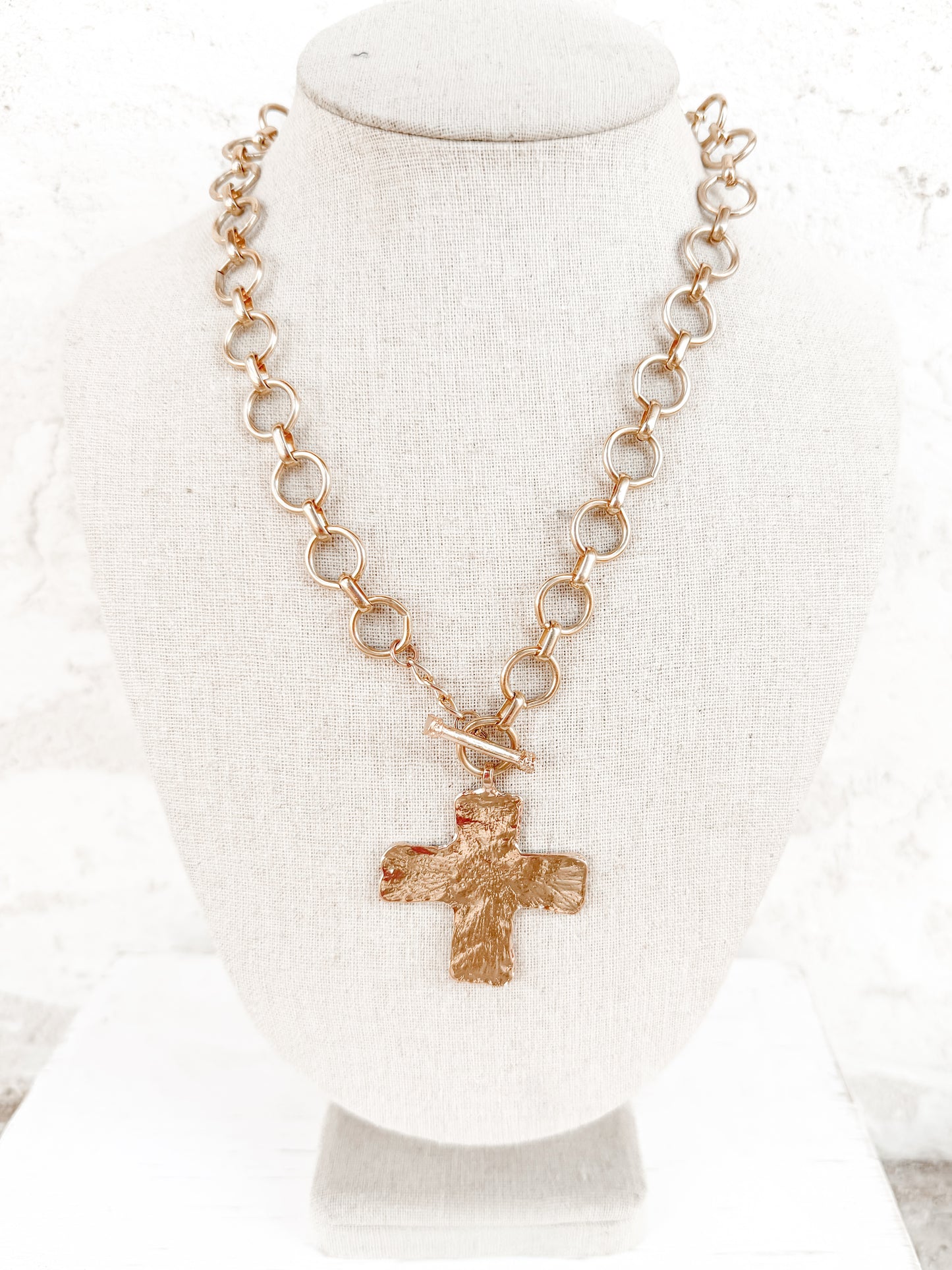 Notable Hammered Cross Front Toggle Necklace